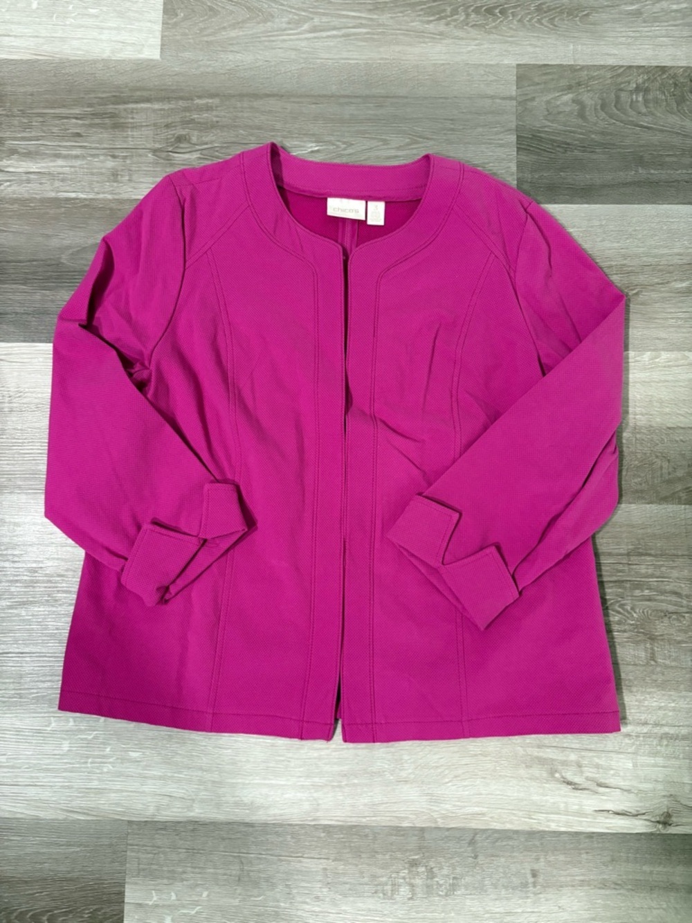 Chicos textured jacket in a bright pink color.
